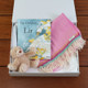 Mc Nutt My First Blanket Gift Set with flamingo pink merino lambswool blanket, Children of Lir storybook, and plush teddy bear—beautifully boxed for newborn gifting, christenings, or Irish heritage baby showers. Mc Nutt My First Blanket Gift Set with flamingo pink merino lambswool blanket, Children of Lir storybook, and plush teddy bear—beautifully boxed for newborn gifting, christenings, or Irish heritage baby showers.